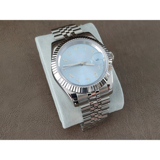 Seiko NH35 watch with 39mm ice blue dial, chromed Arabic numerals, fluted bezel, and silver metal bracelet.