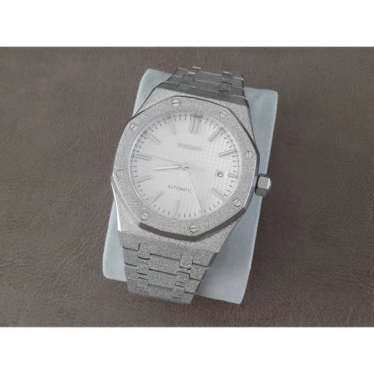 Seiko NH35 watch with frosted silver stainless steel case and bracelet, white dial, and date display at 3 o’clock.