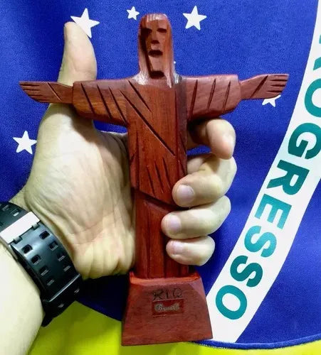 Hand-carved pau-brasil wood Cristo Redentor statue with outstretched arms, 19cm tall.