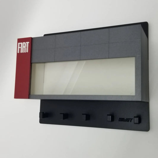 Fiat-themed wall key hook rack with glass display case and five black hooks, red and gray design.