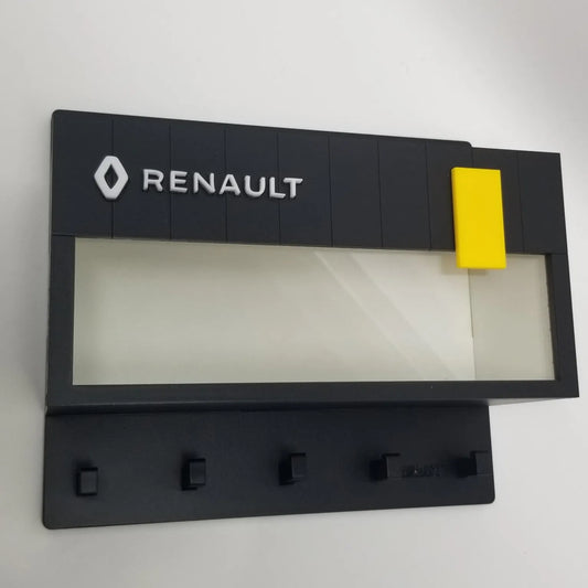 Black Renault wall key hook rack with four hooks and a yellow accent on the top right corner.