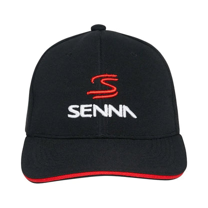 Black cap with red trim on brim, featuring red "S" and white "SENNA" embroidered logo on front.
