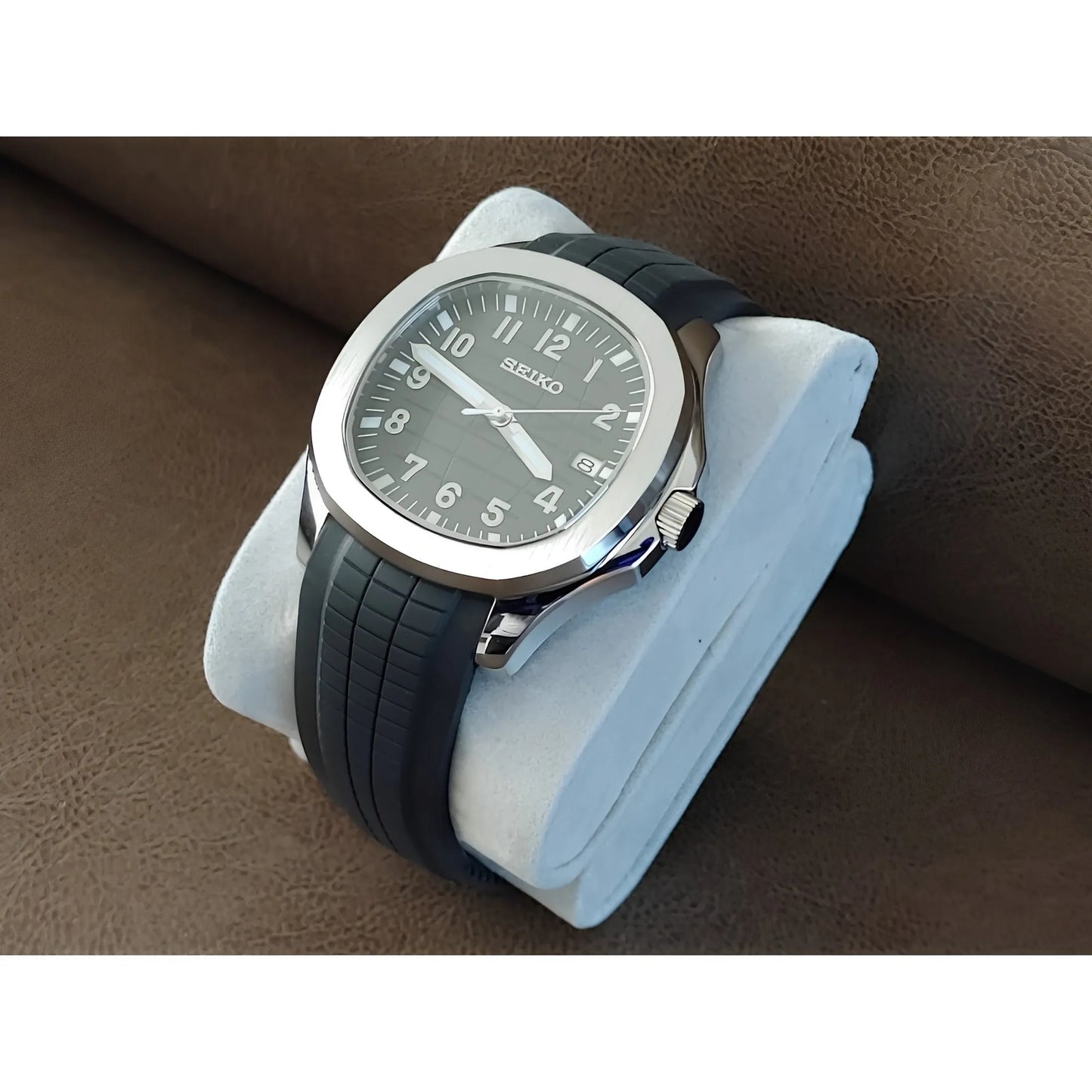 Seiko NH35 Aquanaut 40mm watch with black dial, white numerals, stainless steel case, and black rubber strap.