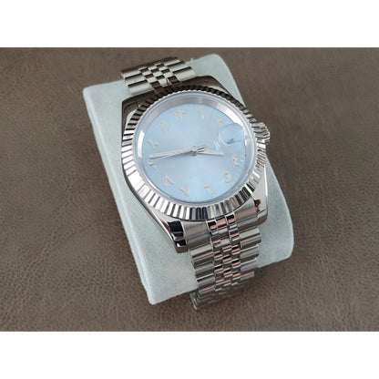 Seiko NH35 watch with 39mm ice blue dial, chromed Arabic numerals, fluted bezel, and silver metal bracelet.
