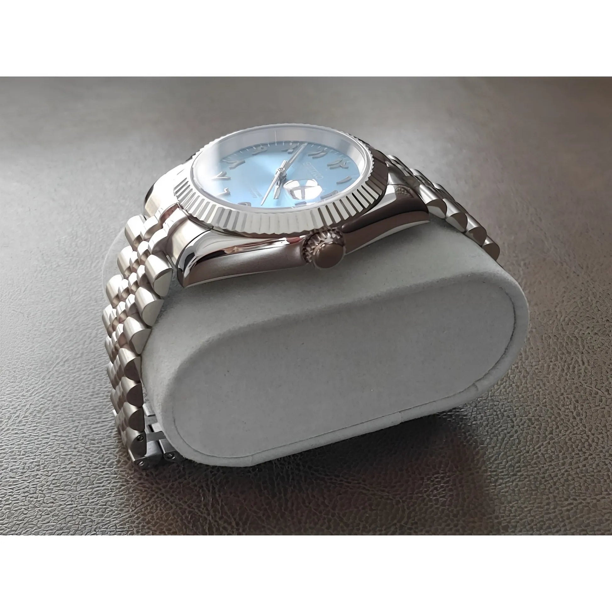 Seiko NH35 watch with 39mm ice blue dial, Arabic numerals, chromed indices, fluted bezel, and stainless steel bracelet.