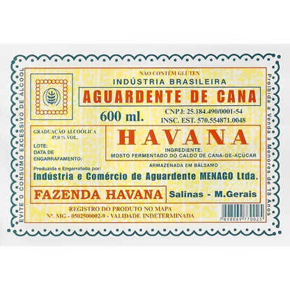 Yellow and red vintage-style label for Havana Aguardente de Cana cachaça, 600ml, with detailed Brazilian text and decorative .