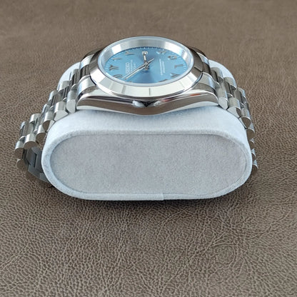 Seiko 39mm watch with ice blue Arabic dial and polished silver President-style bracelet.