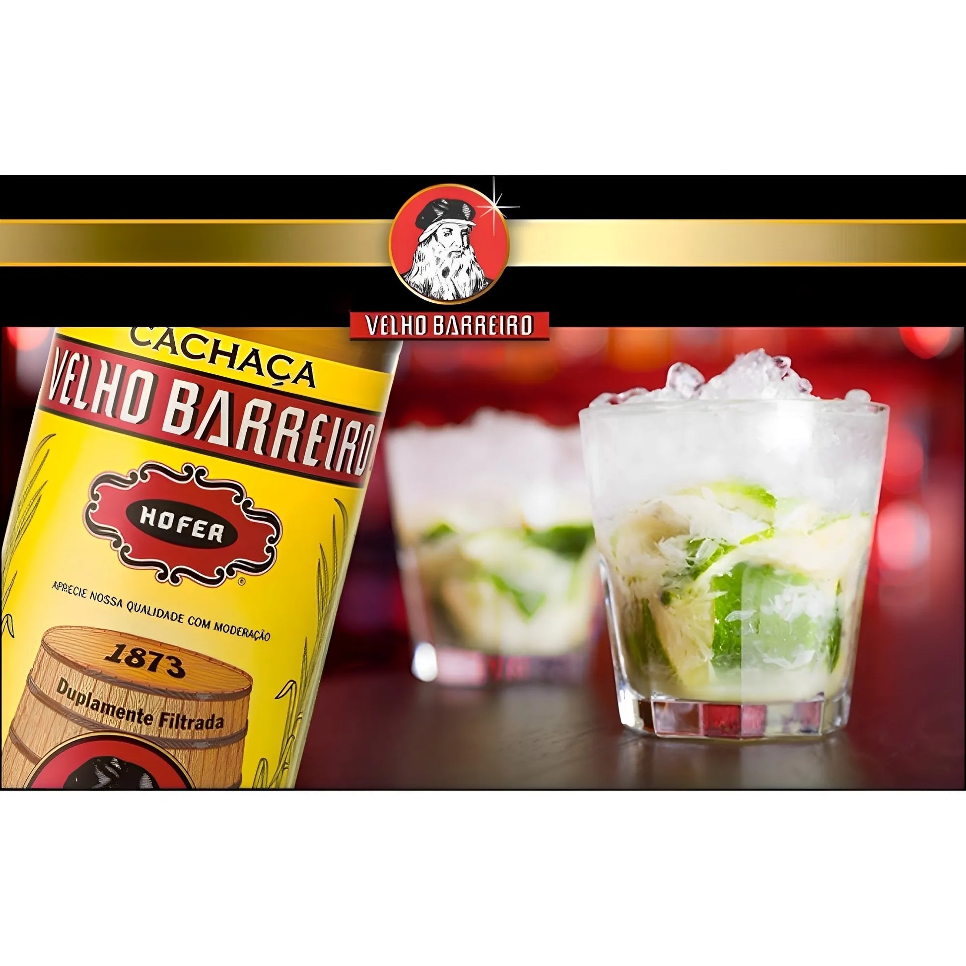 Velho Barreiro Traditional cachaca bottle with yellow label next to two ice-filled cocktails with lime and mint.