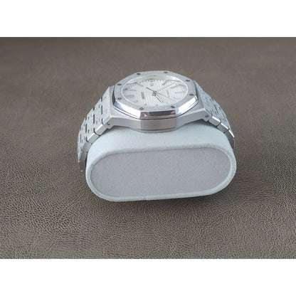 Silver stainless steel watch with frosted white dial and octagonal bezel on metal bracelet.