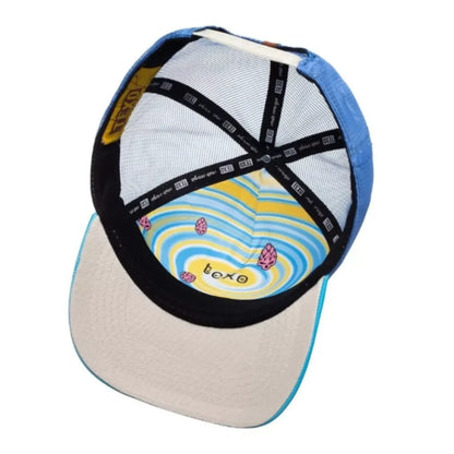 Blue and beige baseball cap with black inner straps and colorful printed underside featuring yellow, blue, and pink swirl.