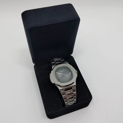 Seiko NH35 Nautilus watch with 40mm silver stainless steel case and bracelet, emerald baguette dial, presented in black.