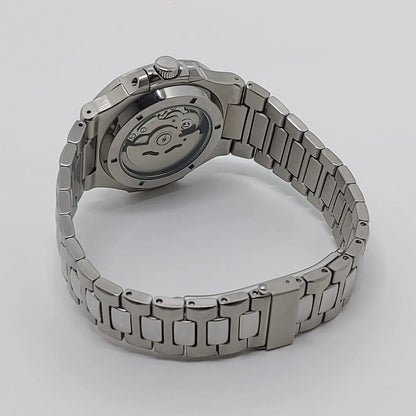 Seiko NH35 watch with stainless steel bracelet and exhibition case back showing mechanical movement.