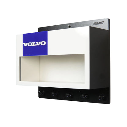 Black and white Volvo wall key hook rack with blue logo and open display shelf.