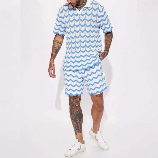 Men's white and blue knit short-sleeve shirt and matching shorts set with wave pattern, paired with white sneakers.
