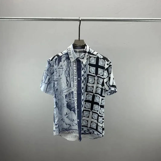Short-sleeve button-up shirt with blue and white artistic and geometric prints, silky fabric.
