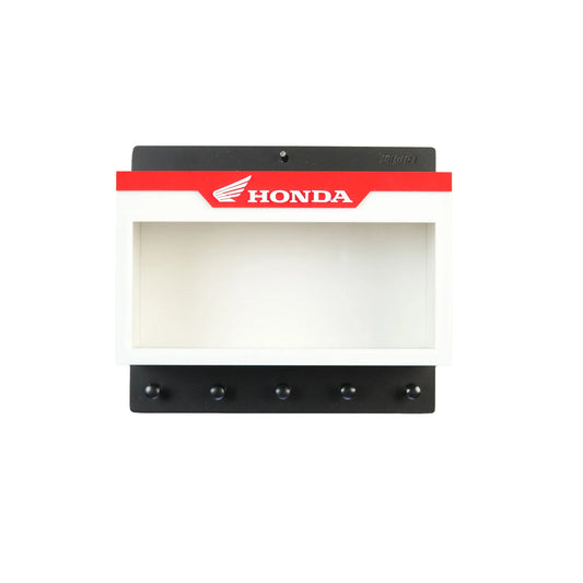 Honda wall key hook rack with white and red frame and five black hooks.