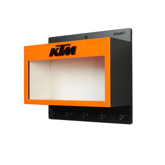 Black and orange KTM wall key hook rack with display case and four black hooks.
