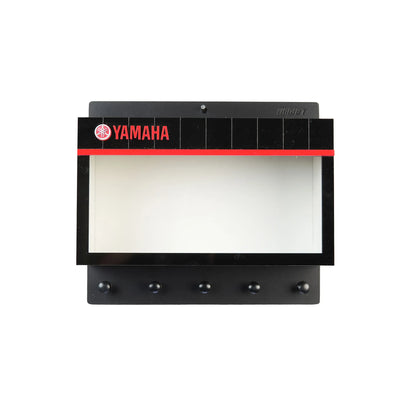 Black rectangular Yamaha wall key hook rack with five round black hooks and red Yamaha logo across top.