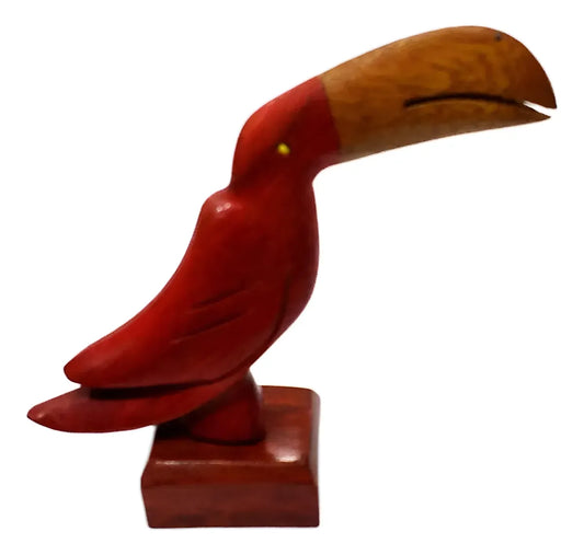 Handcrafted wooden toucan sculpture with red and brown finish on square base.