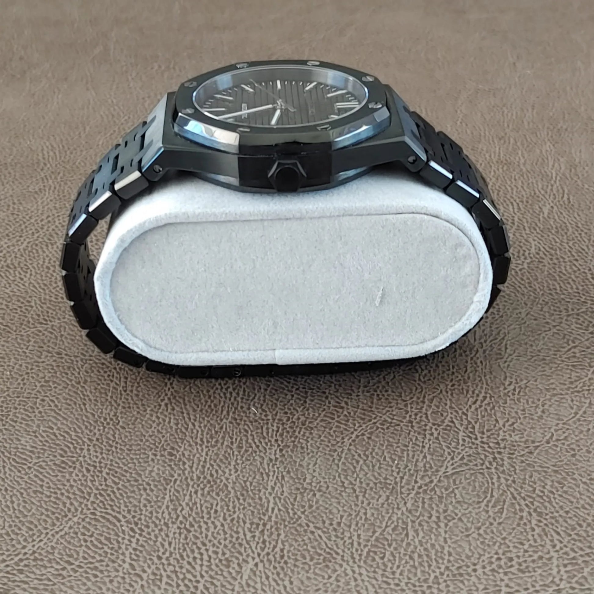 Seiko NH35 Royal Oak 41mm watch with black dial, silver hour markers, and black stainless steel bracelet.