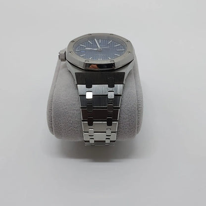 Seiko NH35 Royal Oak 41mm watch with navy blue dial, stainless steel octagonal bezel, and integrated metal bracelet.