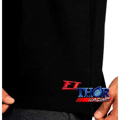 Black t-shirt with small red "FT" logo and blue "Thor Racing" graphic near the bottom hem.