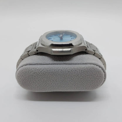 Stainless steel watch with 40mm ice blue dial and Arabic numerals, metal bracelet, day-date window.