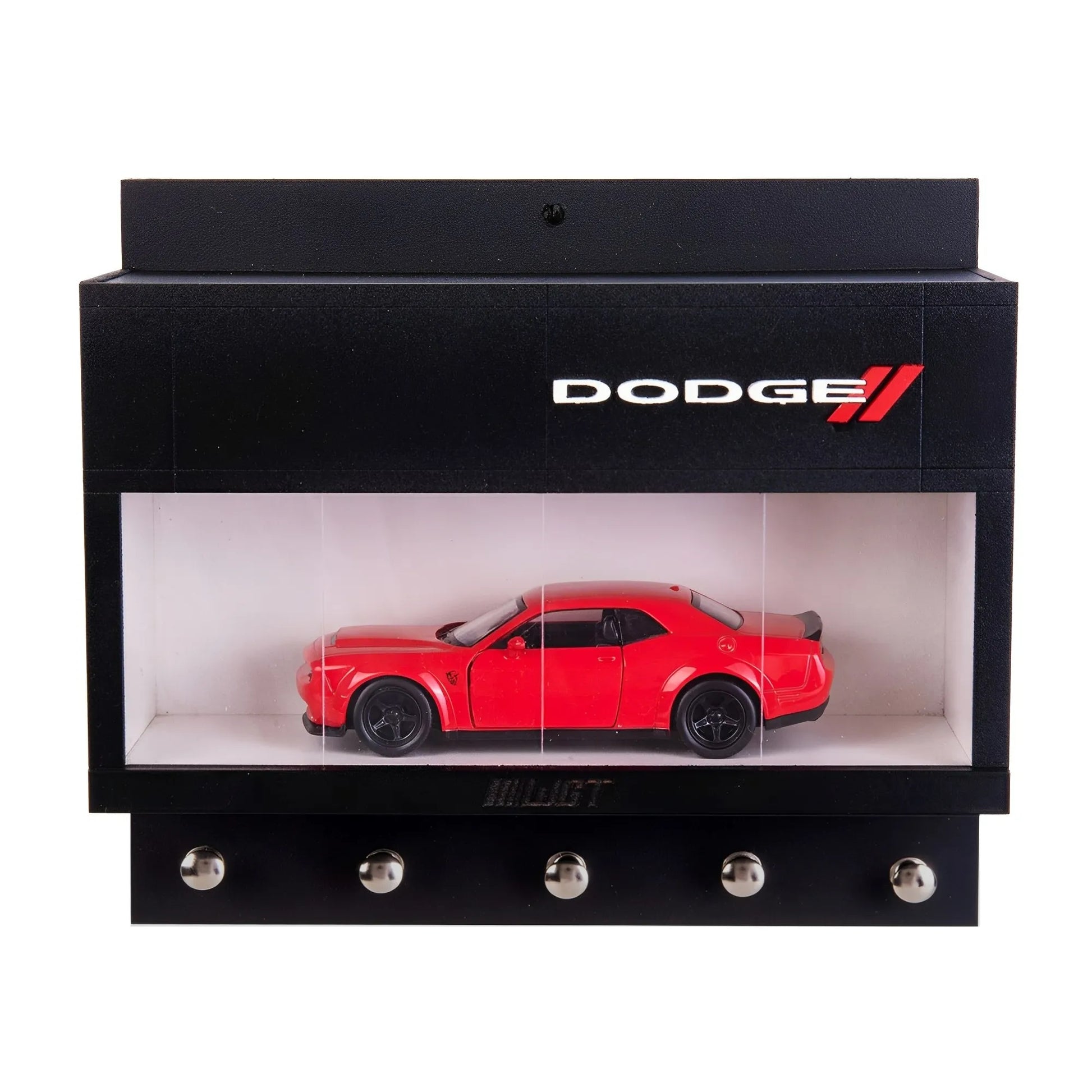 Black wall-mounted key rack with four metal hooks and enclosed display case featuring a red Dodge scale model car.