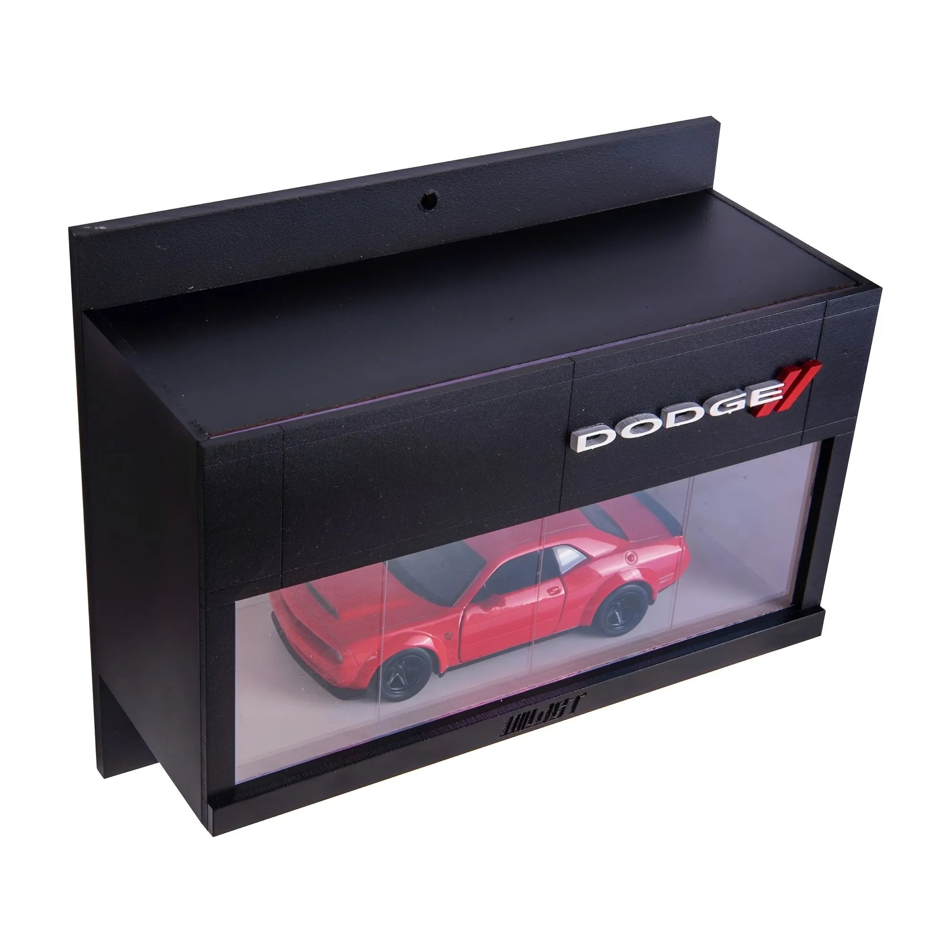 Black rectangular wall-mounted display case with clear front, containing red Dodge scale model car and Dodge logo on top.