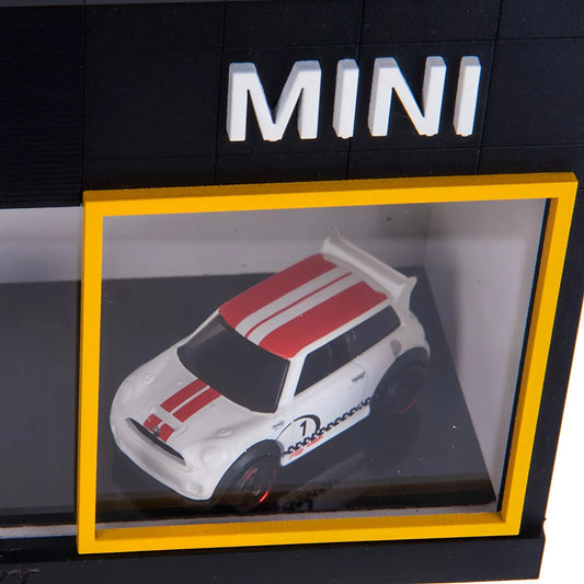 Mini wall key hook rack with yellow frame showcasing white scale model car with red stripes.