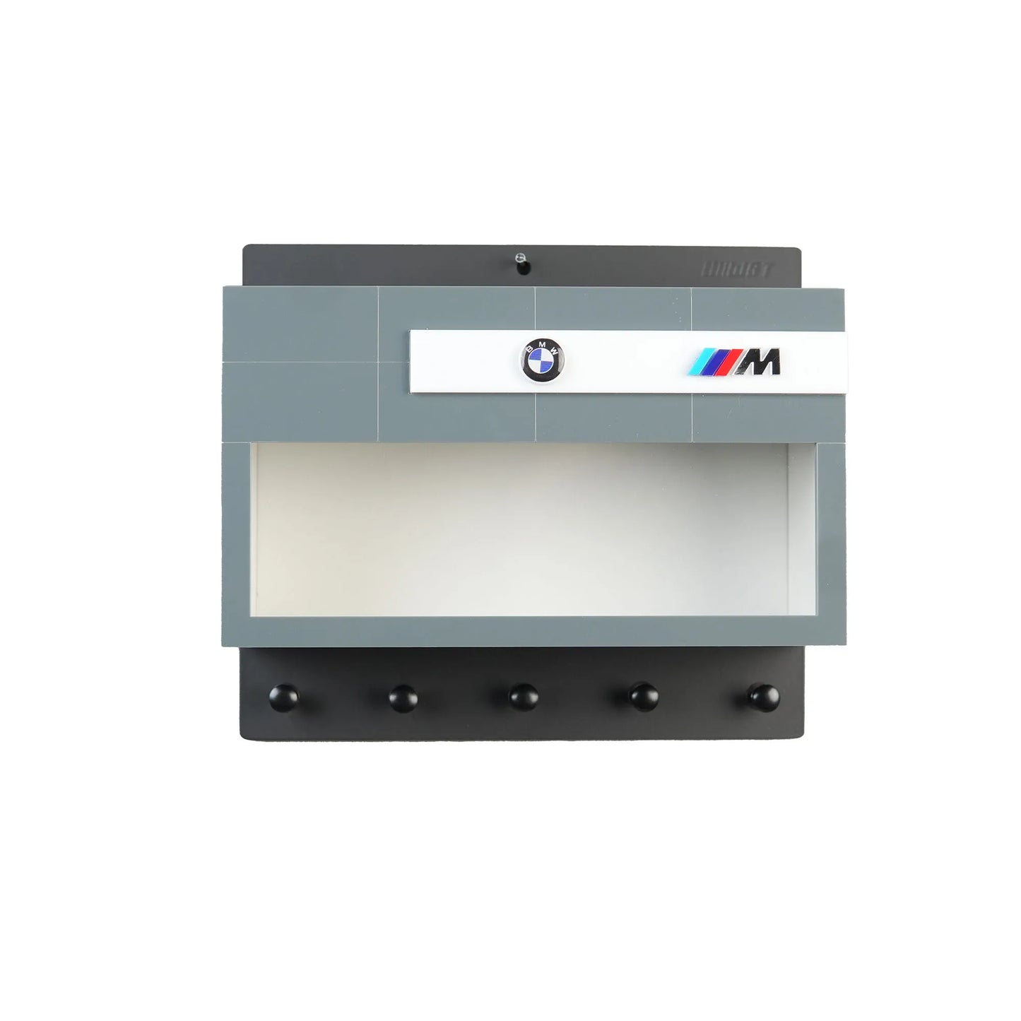 Gray BMW M-themed wall key hook rack with five black hooks and a display case slot.