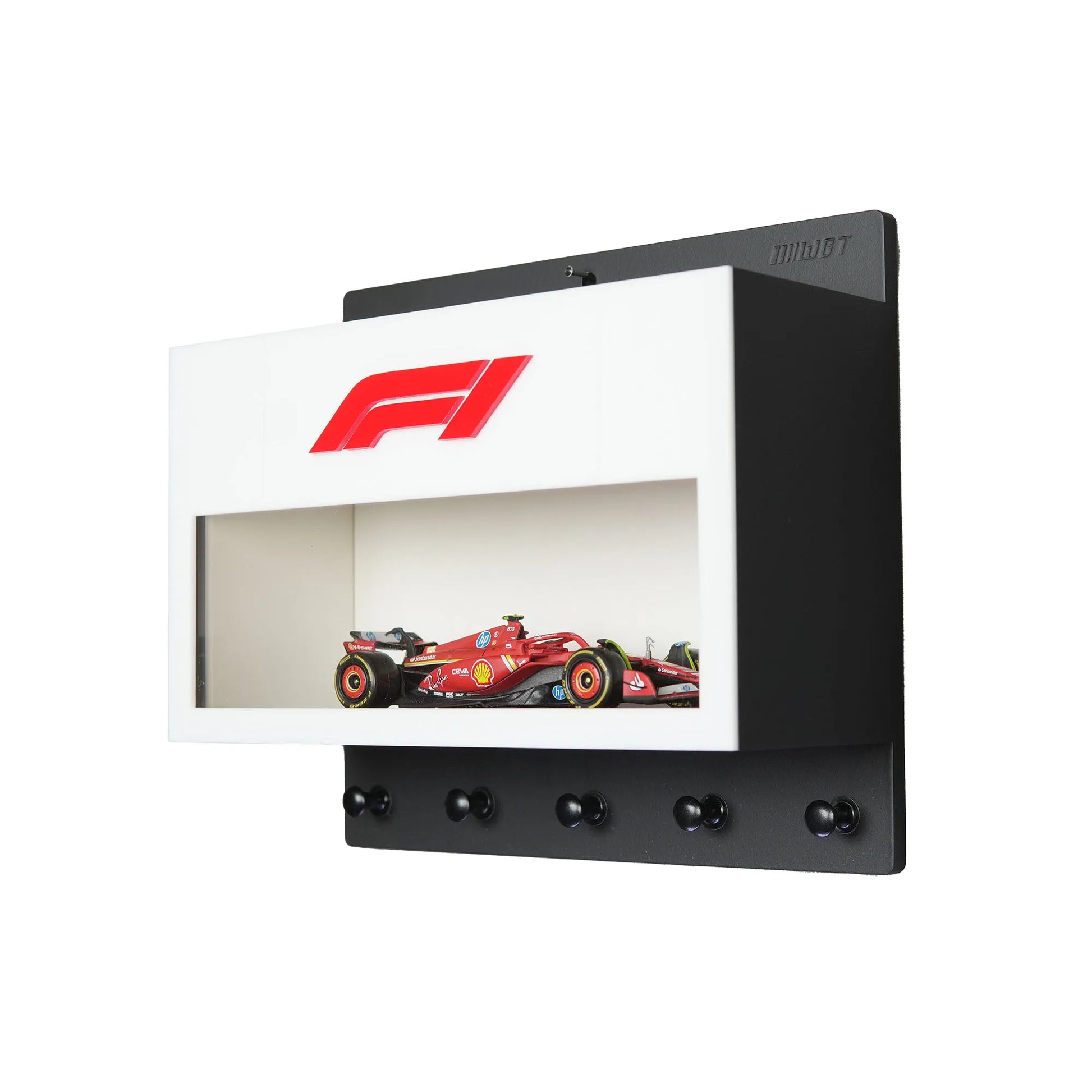 White wall-mounted key hook rack with F1 logo, four black hooks, and a red Formula One car model display case.