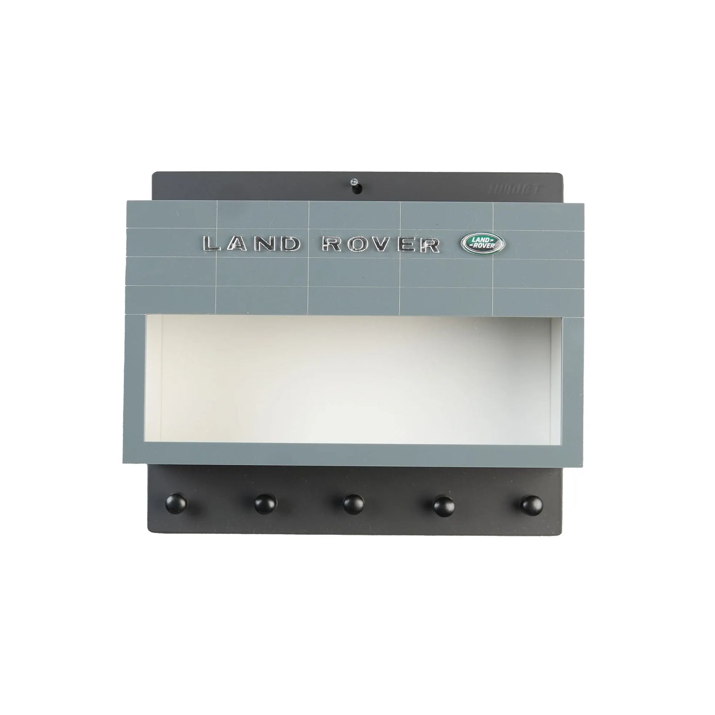 Gray rectangular Land Rover wall key hook rack with five black metal hooks and a display case top section.