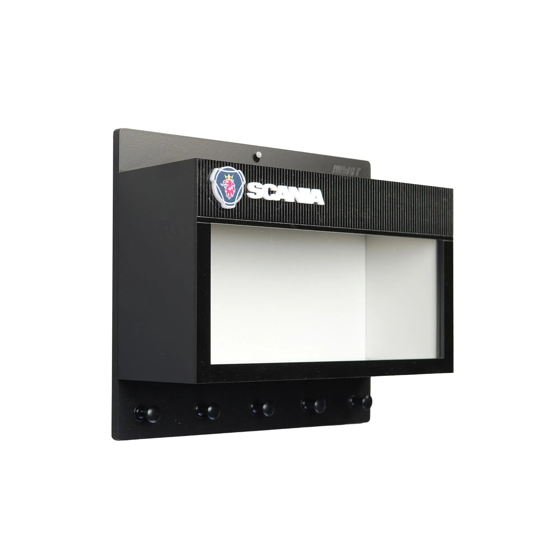 Black wall-mounted key hook rack with Scania logo and transparent display case window.