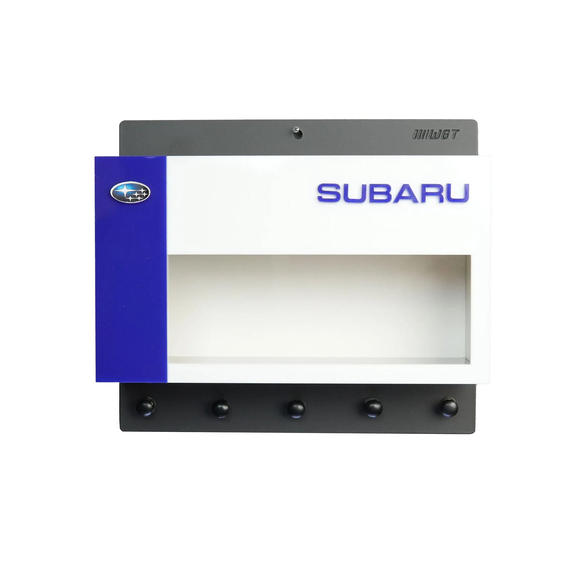 Rectangular Subaru wall key hook rack with blue and white color block design and four black metal hooks.